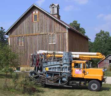 Barn and paint truck after sandblasting